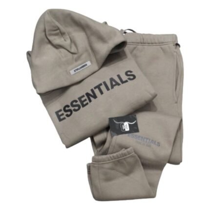 A pair of sweatpants featuring the word "essentials" printed on the side in a bold font.