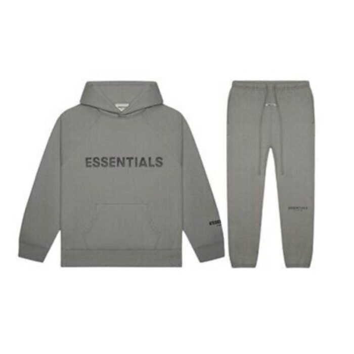 Grey sweatshirt and sweatpants set featuring the word "essentials" prominently displayed on the front.